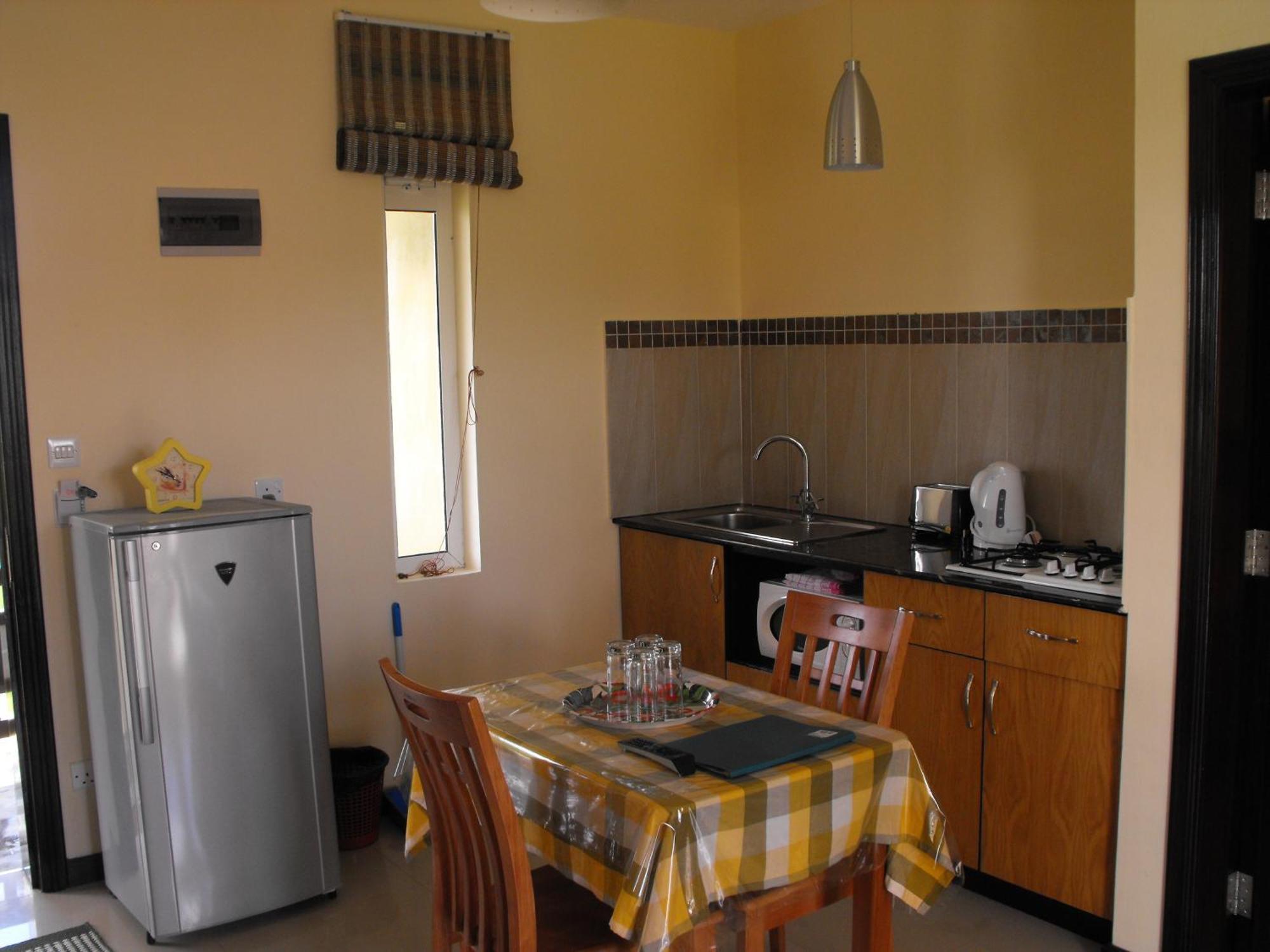 Villa Narmada Гранд Байе Стая снимка